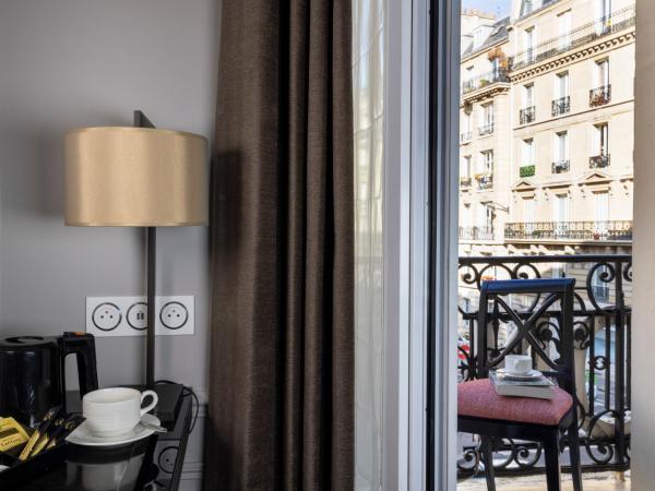 Pavillon Monceau by Happyculture : photo 8 de la chambre chambre double ou lits jumeaux avec balcon