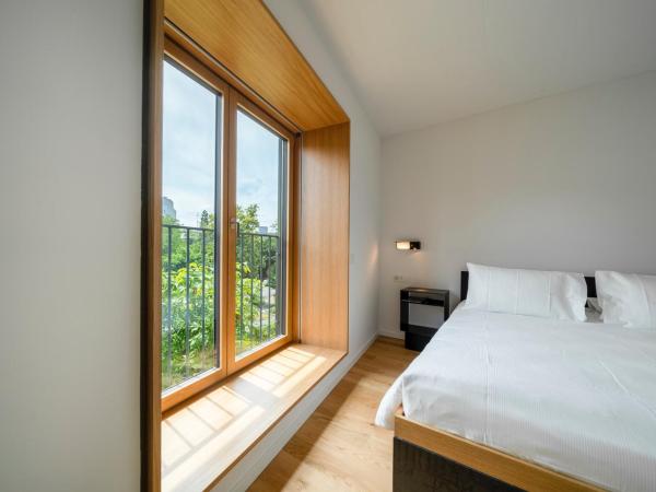 SET Hotel.Residence by Teufelhof Basel : photo 7 de la chambre appartement - vue sur jardin