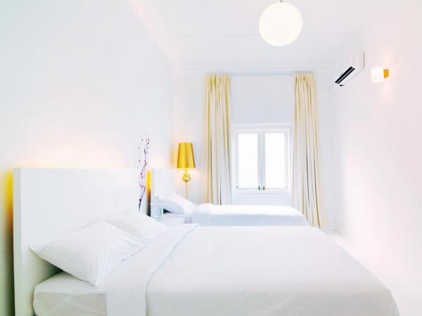 Chulia Heritage Hotel : photo 3 de la chambre chambre triple avec salle de bains commune