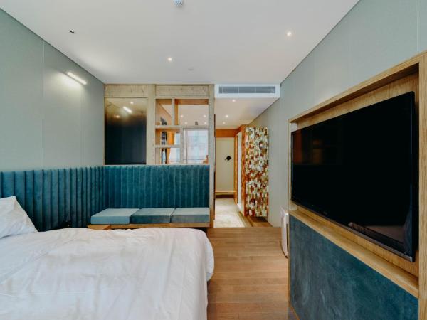 7Shang : photo 1 de la chambre chambre lit queen-size