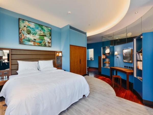 7Shang : photo 5 de la chambre chambre lit king-size - vue sur jardin