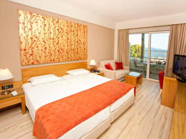 Pharae Palace : photo 1 de la chambre chambre double - vue sur mer