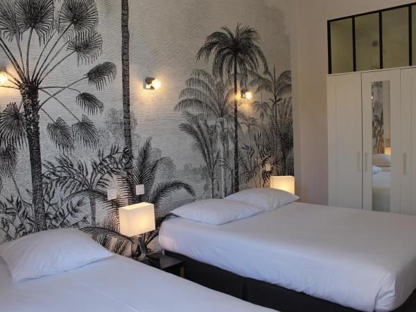 Hotel Les Palmiers : photo 2 de la chambre chambre triple