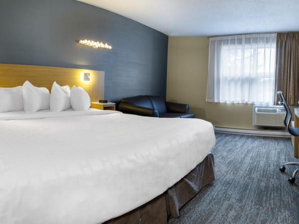 Clarion Pointe Quebec Airport : photo 4 de la chambre chambre lit king-size standard - non-fumeurs