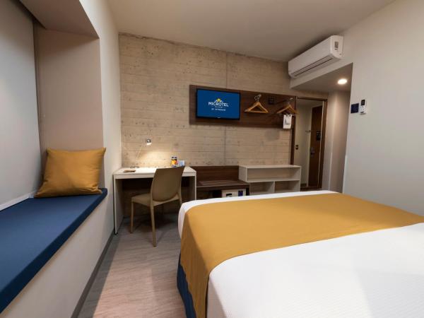 Microtel Inn & Suites by Wyndham Guadalajara Sur : photo 5 de la chambre chambre lit queen-size accessible aux personnes à mobilité réduite - non-fumeurs