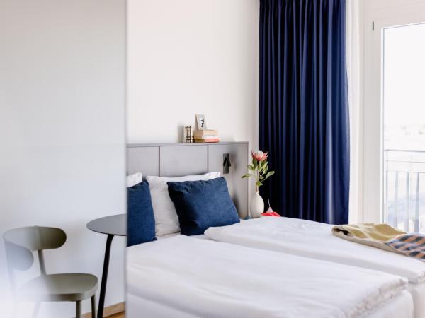 THE FLAG Meiller Gärten : photo 4 de la chambre chambre lits jumeaux