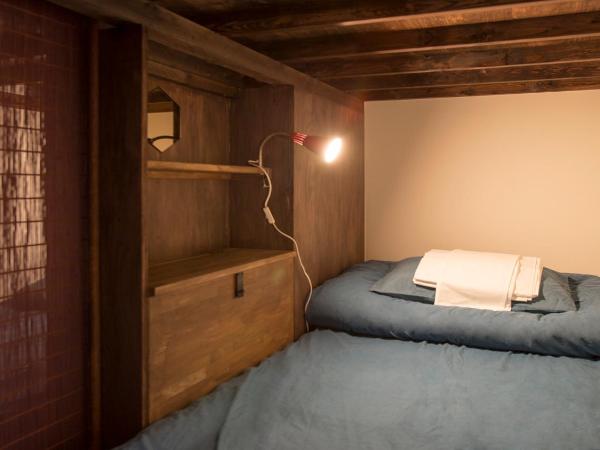 Osaka Guest House U-En : photo 7 de la chambre lit dans dortoir mixte de 12 lits