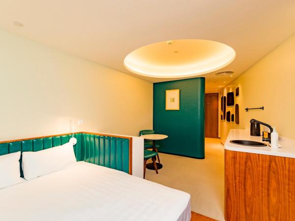 7Shang@金尚·丽 : photo 2 de la chambre chambre double affaires avec accès à la salle de sport