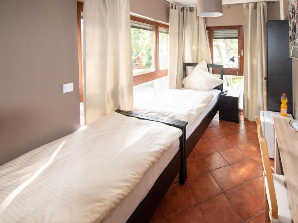 Boutique Hotel Sena : photo 9 de la chambre chambre lits jumeaux avec salle de bains commune