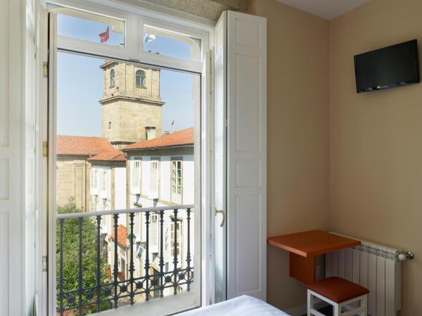 Hotel Montes : photo 2 de la chambre chambre triple