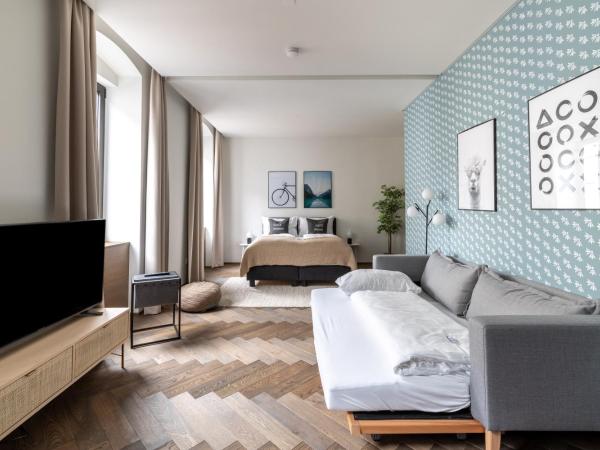 limehome Linz Schillerstraße : photo 1 de la chambre suite m with sofa bed