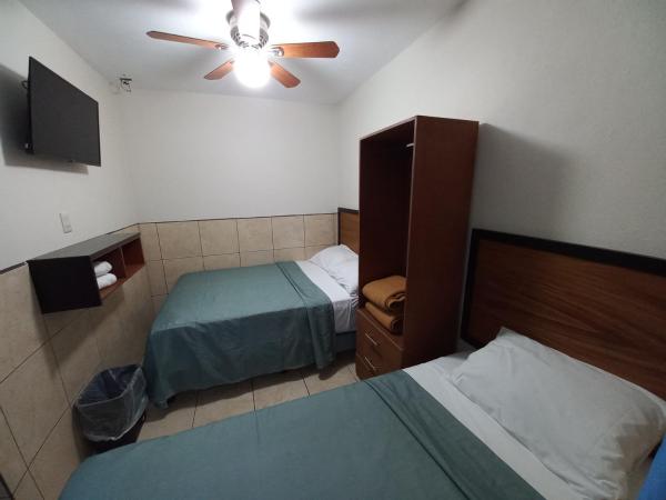 Hotel HCM Guadalajara : photo 3 de la chambre chambre triple