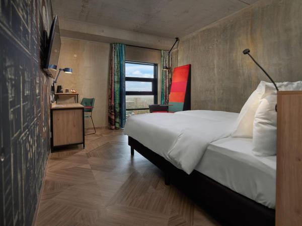 Inntel Hotels Amsterdam Landmark : photo 1 de la chambre chambre lits jumeaux ville