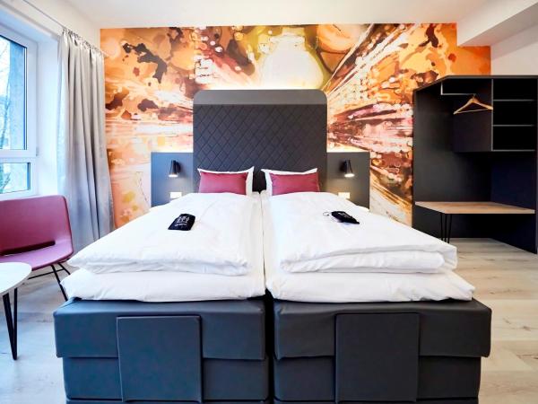 SMARTY Cologne Dom Hotel - Boardinghouse - KONTAKTLOSER SELF CHECK-IN : photo 1 de la chambre grande chambre double