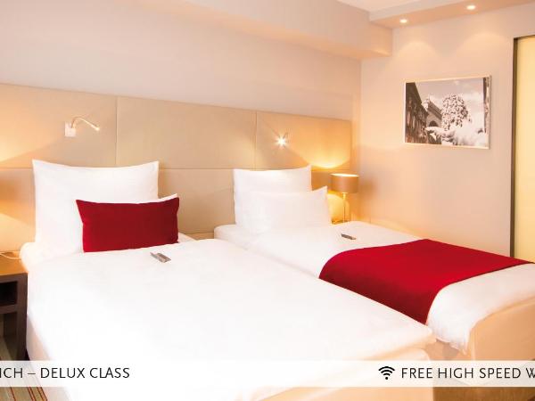 Marc München : photo 1 de la chambre chambre deluxe double ou lits jumeaux