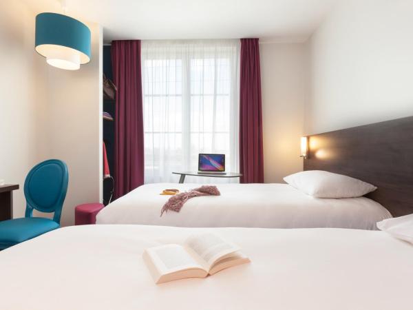 ibis Styles Saumur Gare Centre : photo 2 de la chambre suite familiale standard avec 2 chambres communicantes