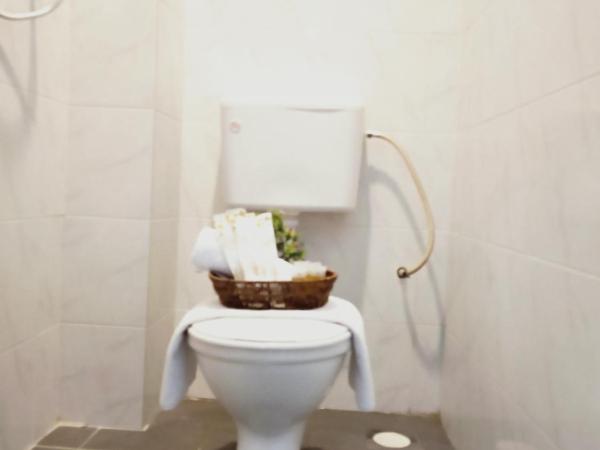 Ghazrin's Garuda Hotel : photo 2 de la chambre chambre familiale supérieure