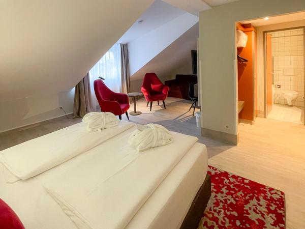 Ramada by Wyndham Dresden : photo 3 de la chambre suite junior