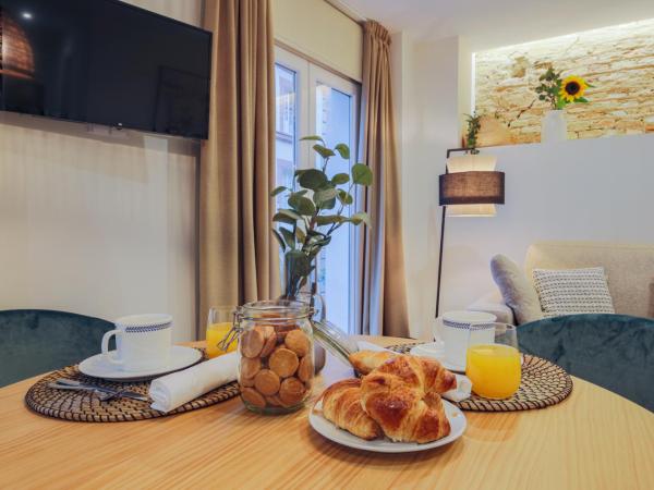 Apartamentos Magna Sevilla : photo 5 de la chambre suite 1 chambre