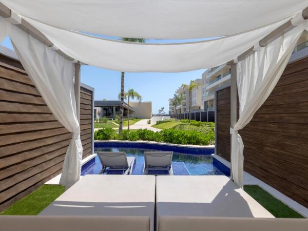 Planet Hollywood Cancun, An Autograph Collection All-Inclusive Resort : photo 10 de la chambre suite junior accès direct piscine