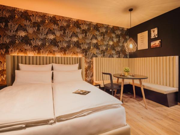 Rioca Stuttgart Posto 4 : photo 1 de la chambre studio lit queen-size