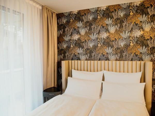 Rioca Stuttgart Posto 4 : photo 4 de la chambre studio lit queen-size