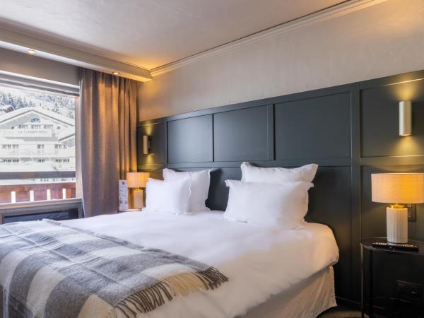 Grand Hôtel Courchevel 1850 : photo 4 de la chambre chambre confort avec balcon - vue sur pistes ou vallée