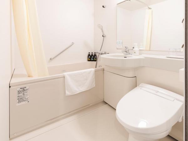 Sotetsu Fresa Inn Nagoya-Shinkansenguchi : photo 3 de la chambre hébergement lits jumeaux - non-fumeurs