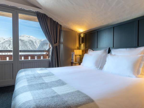 Grand Hôtel Courchevel 1850 : photo 1 de la chambre chambre confort avec balcon - vue sur pistes ou vallée