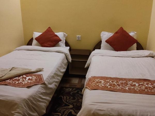 Jungle Front Lodge : photo 7 de la chambre chambre lits jumeaux