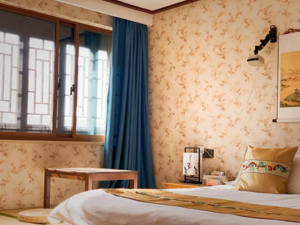 Suzhou Jade Snow Lodge : photo 10 de la chambre suite deluxe - vue sur rivière