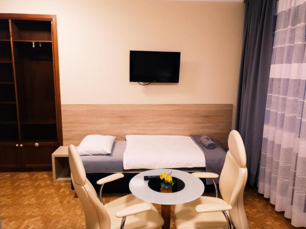 Biały Słoń : photo 3 de la chambre chambre triple avec salle de bains privative