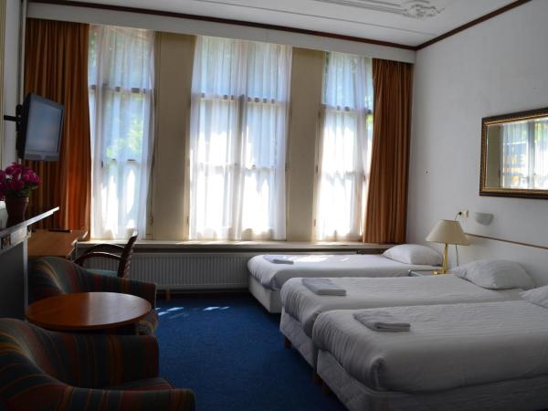 Hotel de Munck : photo 3 de la chambre chambre quadruple avec salle de bains privative