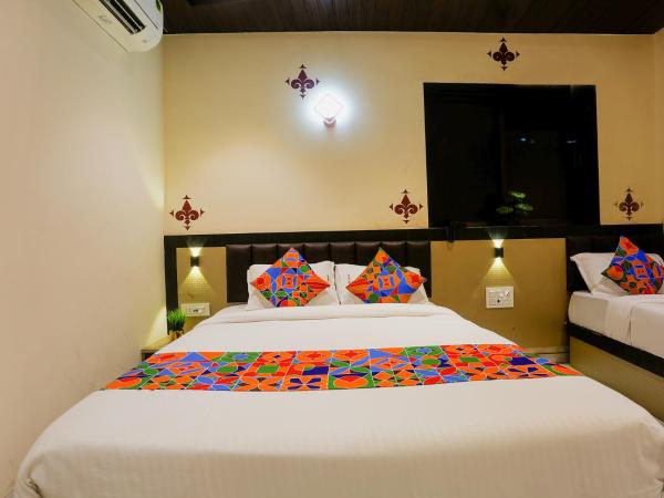 FabExpress Prime Land : photo 2 de la chambre chambre familiale