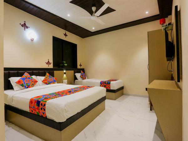 FabExpress Prime Land : photo 4 de la chambre chambre familiale