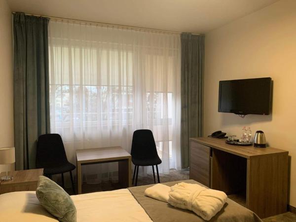 Magnolia Ośrodek Rehabilitacyjno-Wczasowy : photo 1 de la chambre chambre lits jumeaux avec balcon