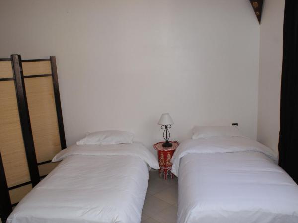 Résidence Louzani : photo 3 de la chambre appartement (4 adultes)