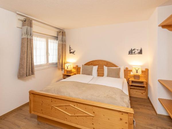 Grichting Hotel & Serviced Apartments : photo 5 de la chambre suite avec balcon