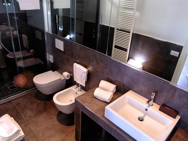 Baldinini Hotel : photo 7 de la chambre chambre quadruple - vue partielle sur mer