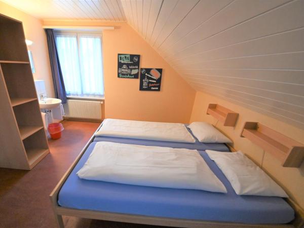 Bern Backpackers Hotel Glocke : photo 1 de la chambre chambre double standard avec salle de bains commune