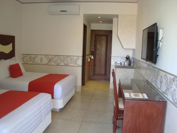 Hosteria Las Quintas Hotel Restaurante Bar : photo 8 de la chambre suite avec 2 lits doubles