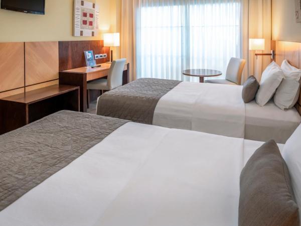 Serhs Natal Grand Hotel & Resort : photo 3 de la chambre chambre double de luxe avec vue latérale sur la mer