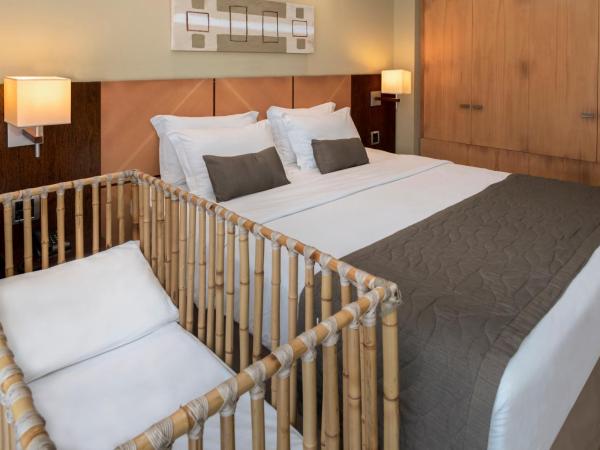 Serhs Natal Grand Hotel & Resort : photo 5 de la chambre chambre double de luxe avec vue latérale sur la mer