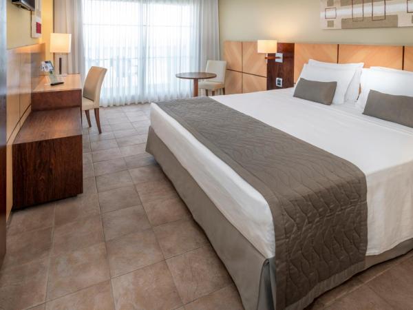 Serhs Natal Grand Hotel & Resort : photo 1 de la chambre chambre double de luxe avec vue latérale sur la mer