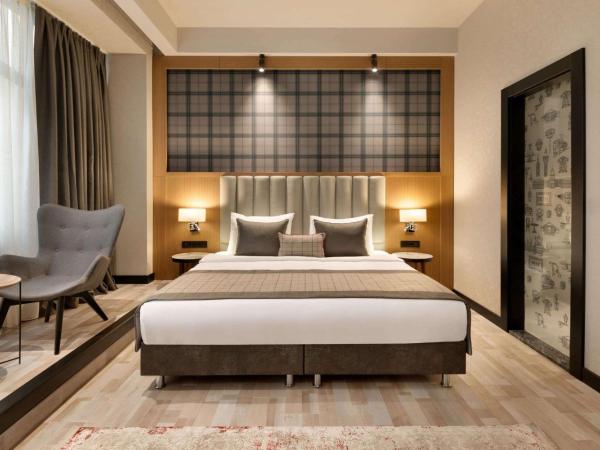 Ramada by Wyndham Budapest City Center : photo 3 de la chambre chambre lit king-size deluxe - non-fumeurs