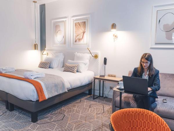 Hôtel D'Anjou : photo 2 de la chambre chambre triple deluxe avec climatisation