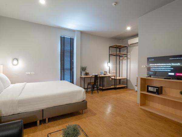 The Arbern Hotel x Bistro - SHA Extra Plus : photo 2 de la chambre suite deluxe avec lit king-size