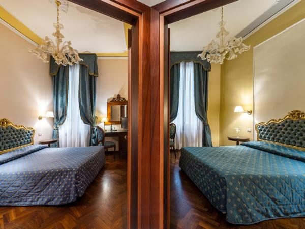 Locanda Sant'Agostin : photo 1 de la chambre chambre quadruple