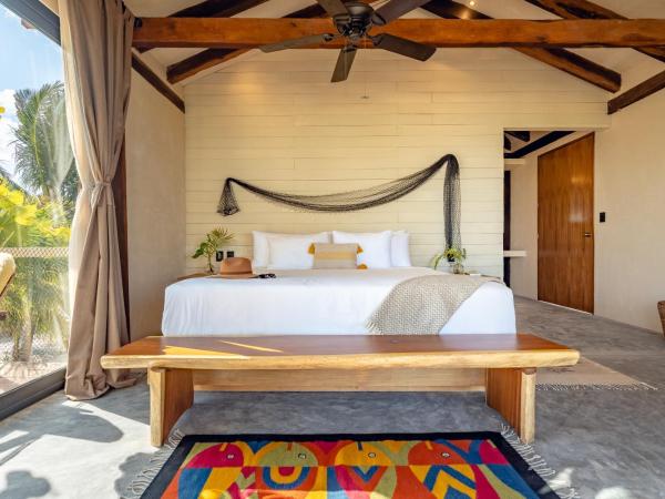 Villa Pescadores Tulum : photo 1 de la chambre chambre double deluxe avec balcon