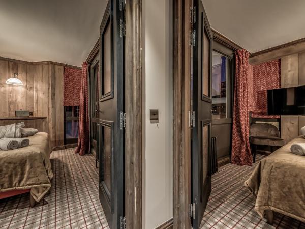 Hotel & Spa Le Val d'Isère : photo 4 de la chambre hébergement 1 chambre quadruple